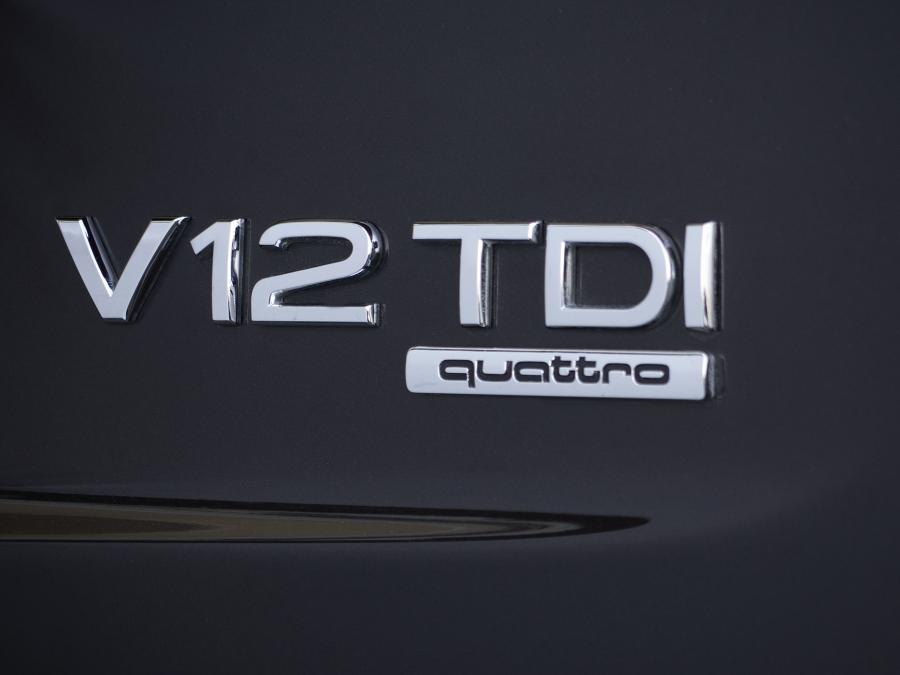 Логотип Audi Q7 V12 TDI Quattro (4L) 2009 года  (UK) (фото 14 из 15)